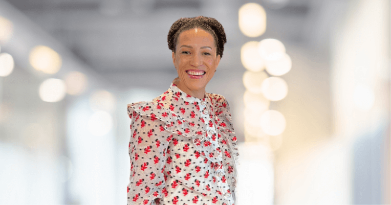 Veronika Skagestad smiling to the camera in an office
